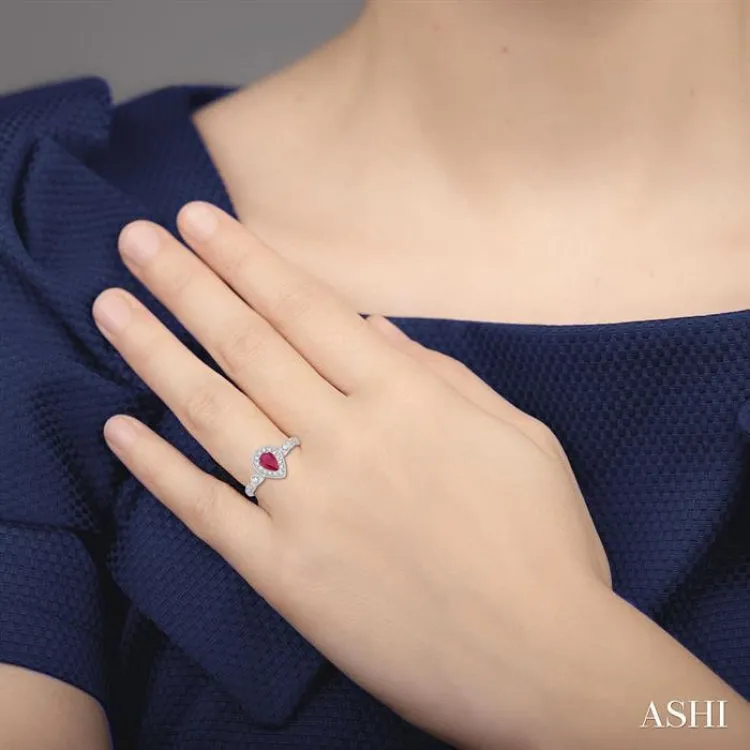 6X4 MM Pear shape Ruby Center and 1/4 Ctw Round Cut Diamond Ring in 14K White Gold