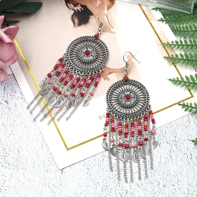 Beaded fringed hollow earrings