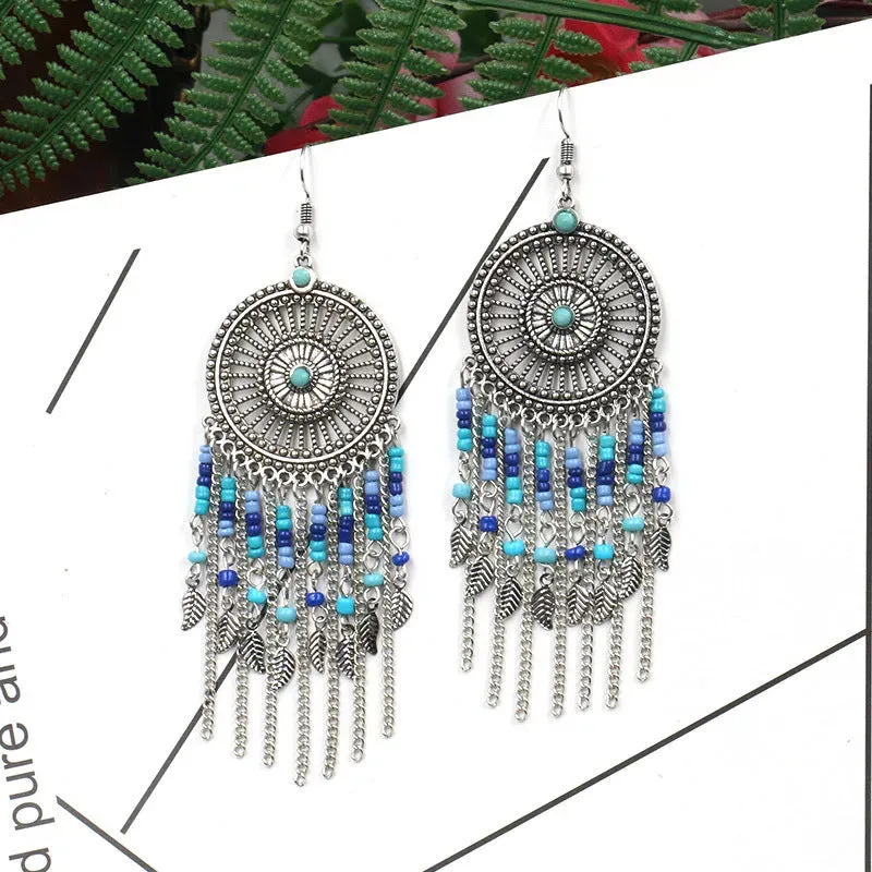 Beaded fringed hollow earrings