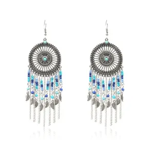 Beaded fringed hollow earrings