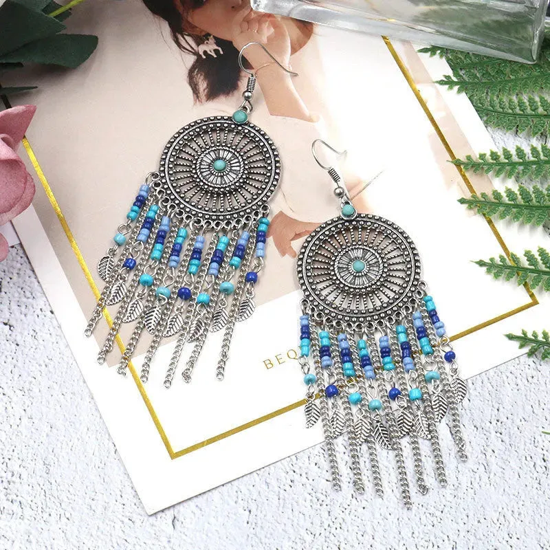 Beaded fringed hollow earrings