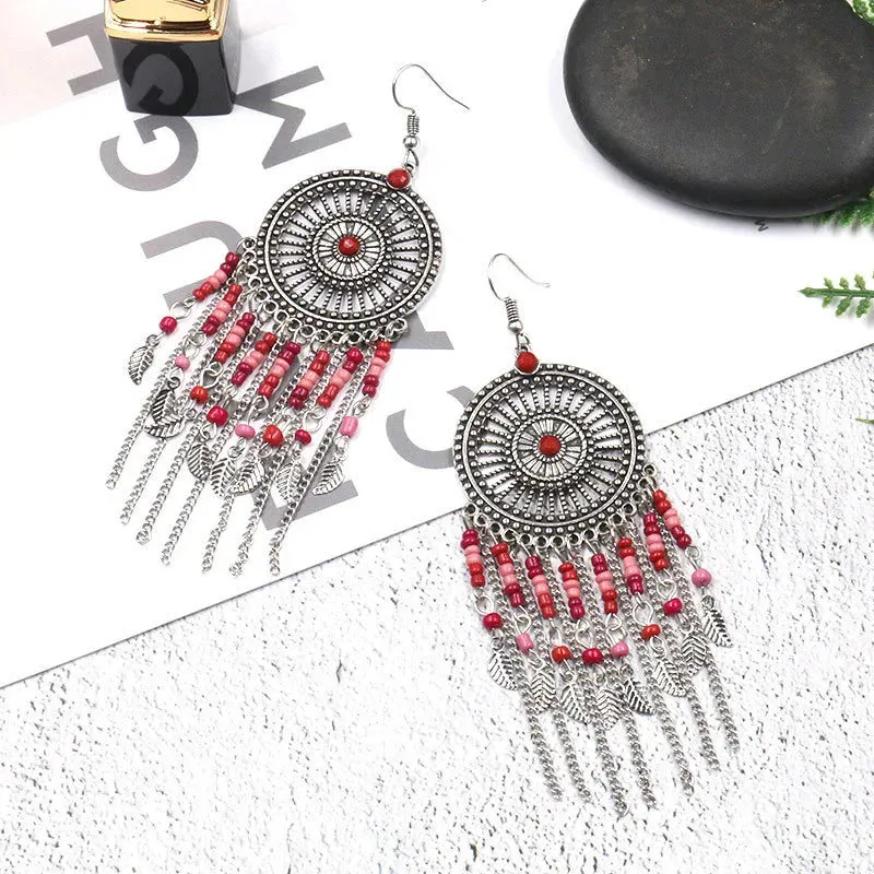 Beaded fringed hollow earrings