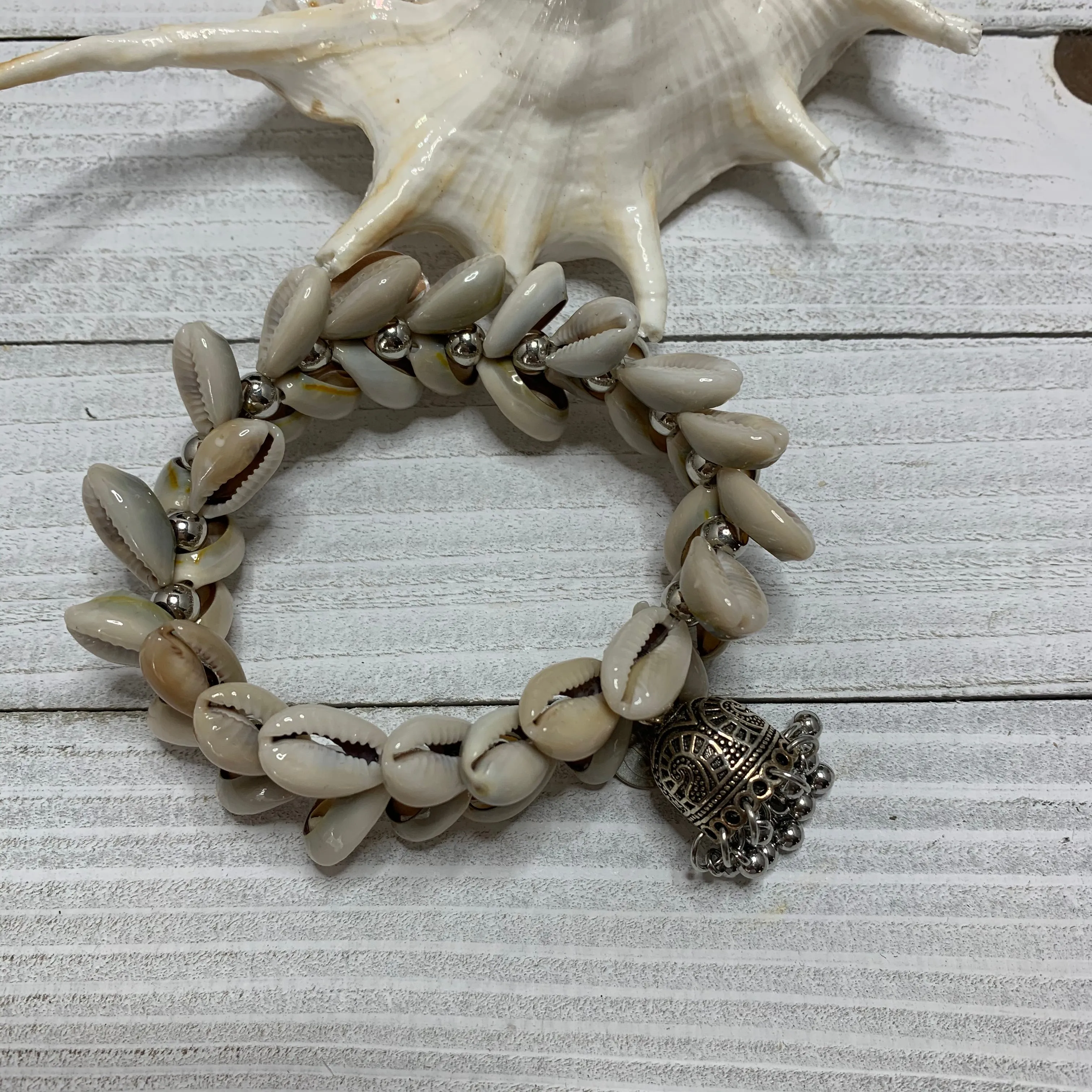 Cowry Shells Bracelet with a Silver Metallic Tassel 440-02 | Erika Williner Designs