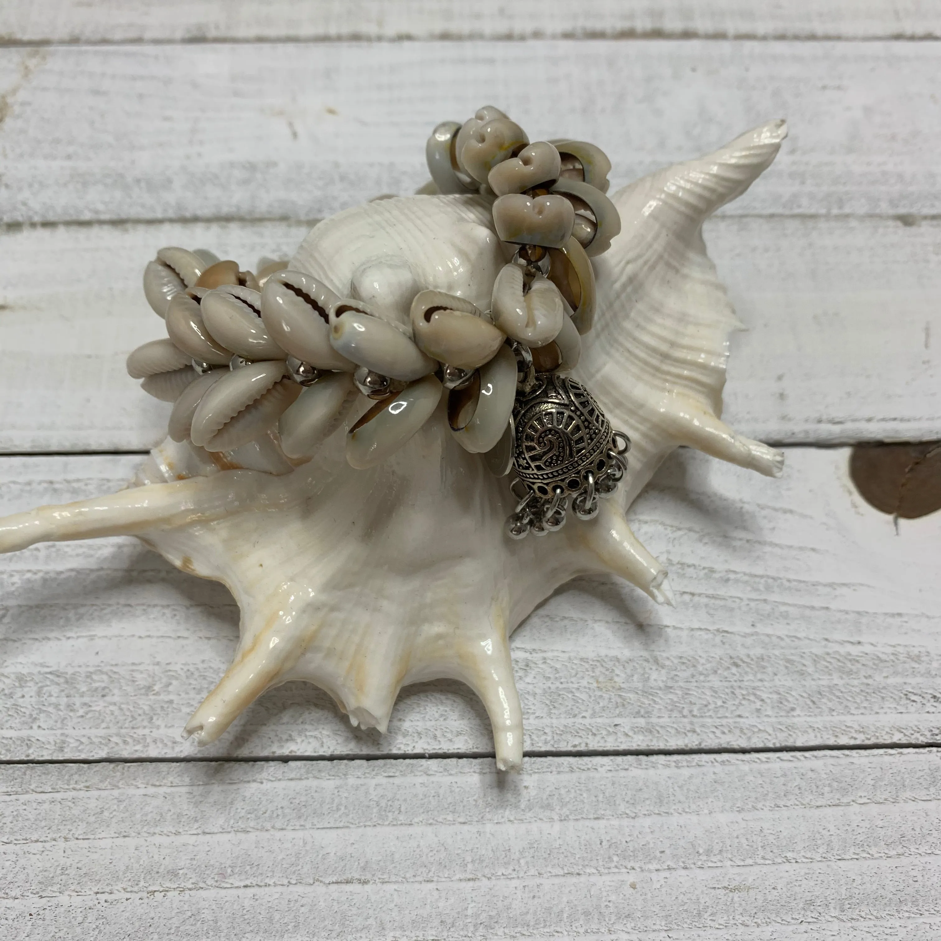 Cowry Shells Bracelet with a Silver Metallic Tassel 440-02 | Erika Williner Designs