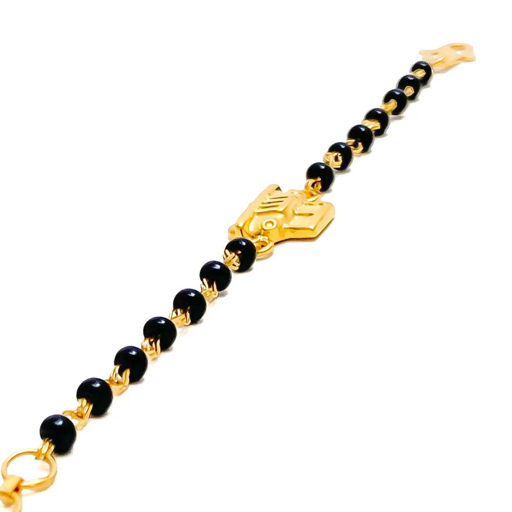 Dazzling Petite 22k Gold Black Bead Baby Bracelet