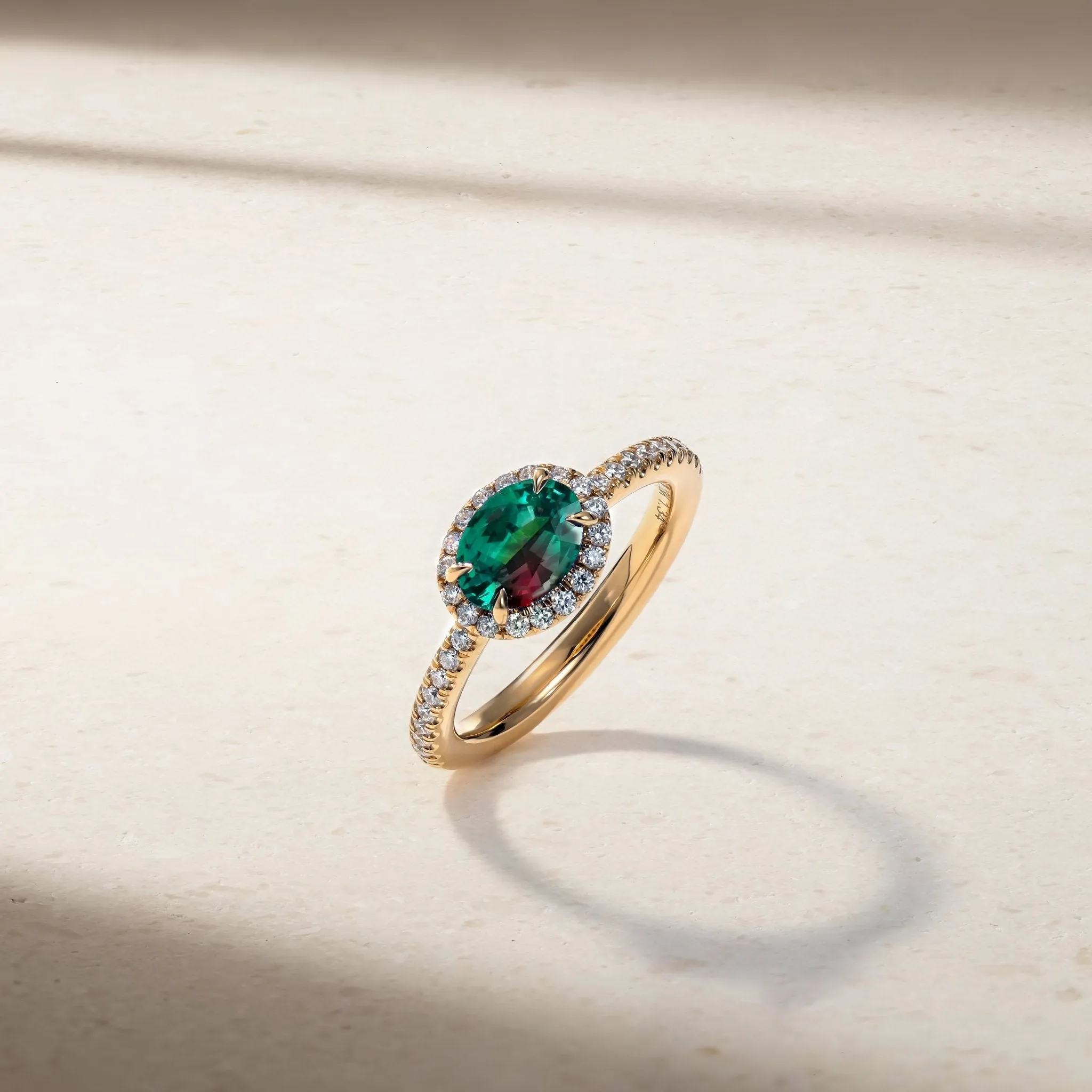 East-West Alexandrite and Diamond Halo Ring