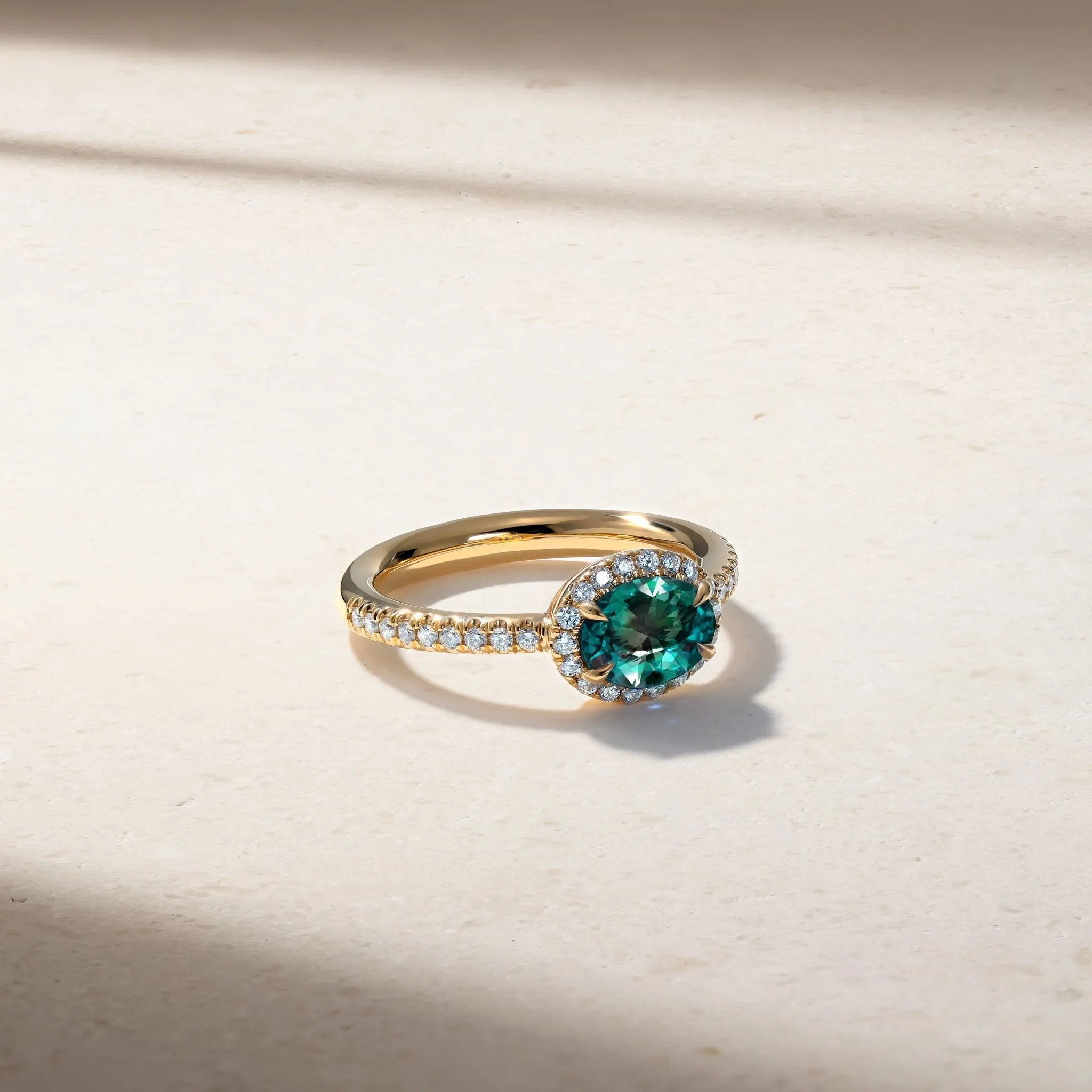 East-West Alexandrite and Diamond Halo Ring