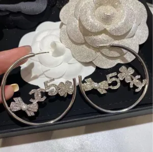 Exclusive logo “5” earrings