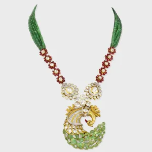 Grace your jewelry collection with this exquisite designer peacock necklace and earring set, featuring dazzling diamond rounds, radiant diamond Polki, and vibrant emeralds and rubies - KMNE3529