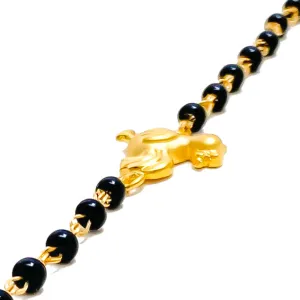Radiant Sleek 22k Gold Black Bead Baby Bracelet