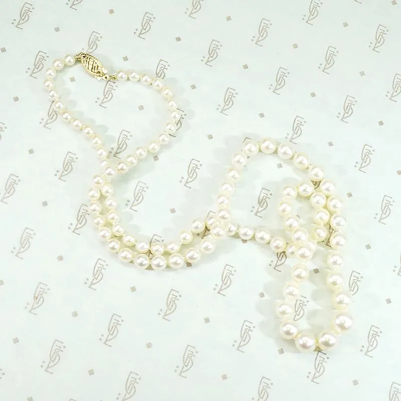 Radiant Strand of Pearls with Gold Clasp
