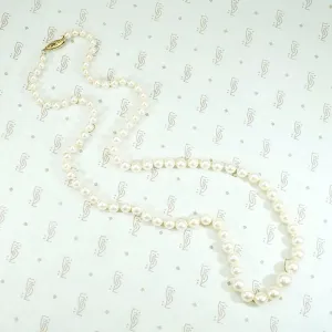 Radiant Strand of Pearls with Gold Clasp