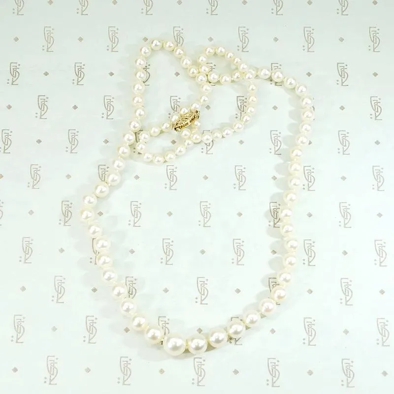 Radiant Strand of Pearls with Gold Clasp
