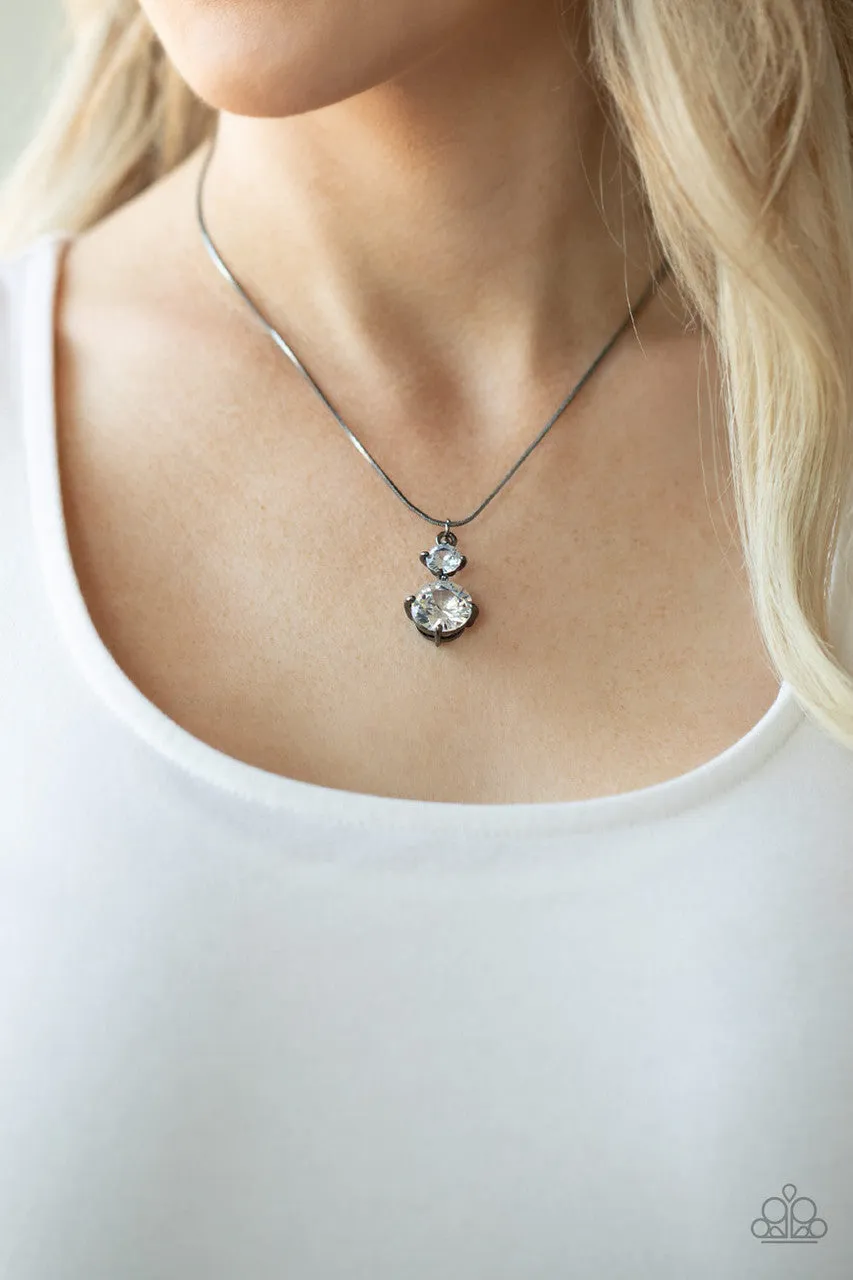 Top Dollar Diva - Black - White Rhinestone Gunmetal Setting Paparazzi Short Necklace - February 2021 Life of the Party Exclusive